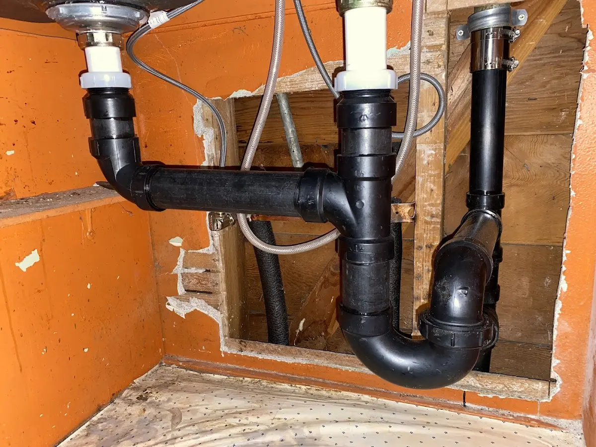 Professional Garbage Disposal Repair equipment and tools on the job in Stepping Stone